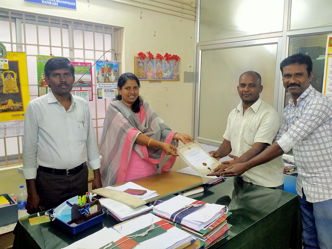 Chief Master Suresh receiving government certification at Tamil Nadu Revenue Office
